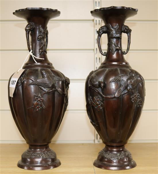 A pair of Japanese bronze vases, 37cm